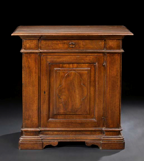 Appraisal: Italian Provincial Walnut Cabinet the rectangular top with molded edge