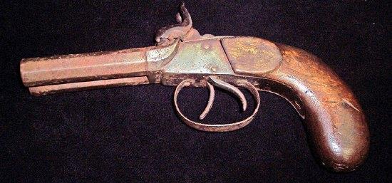 Appraisal: A double barrelled percussion cap pistol with octagonal screw off