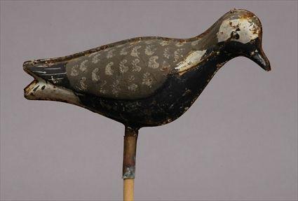 Appraisal: TWELVE PAINTED TIN HINGED DECOYS BLACK BREASTED PLOVERS Each in