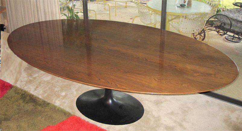 Appraisal: EERO SAARINEN KNOLL ROSEWOOD TOP TULIP TABLE Black base large