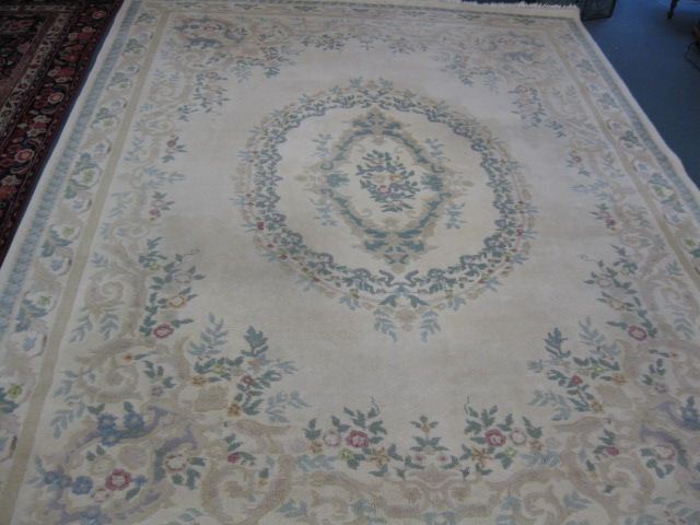 Appraisal: Kerman Style Handmade Room Size Rug soft floral on ivory