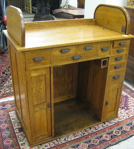 Appraisal: AN OAK ROLLTOP WATCHMAKER'S DESK American c the rectangular top