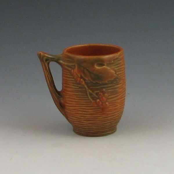 Appraisal: Roseville Bushberry handled cup in brown Marked R USA -