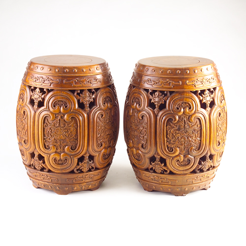 Appraisal: Pair of Chinese drum-shaped wood garden seats with reticulated panels