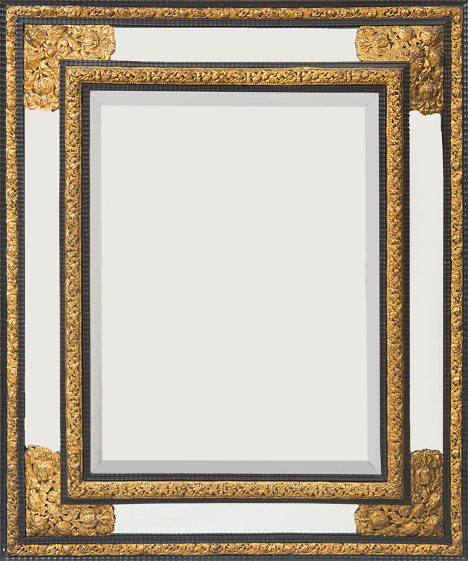 Appraisal: FLEMISH BAROQUE STYLE EMBOSSED BRASS AND EBONIZED MIRROR The rectangular