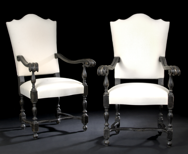 Appraisal: Pair of Baronial-Style Ebonized Fauteuils each with a domed and