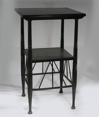 Appraisal: An ebonised wood side table after a design by E