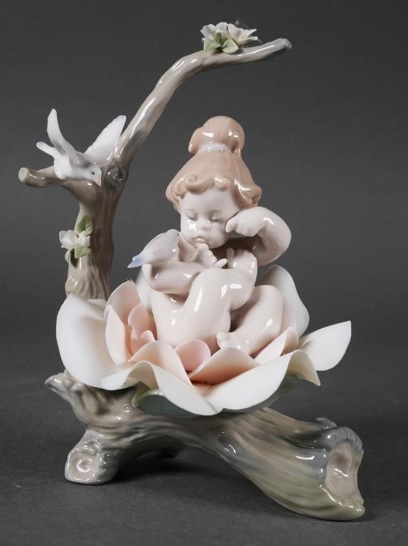 Appraisal: Porcelain Lladro figurine of a young girl in flower center