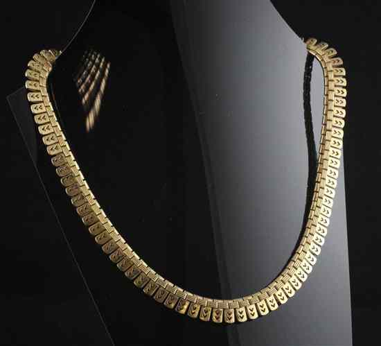 Appraisal: An ct gold fringe necklace with pierced heart decoration ins