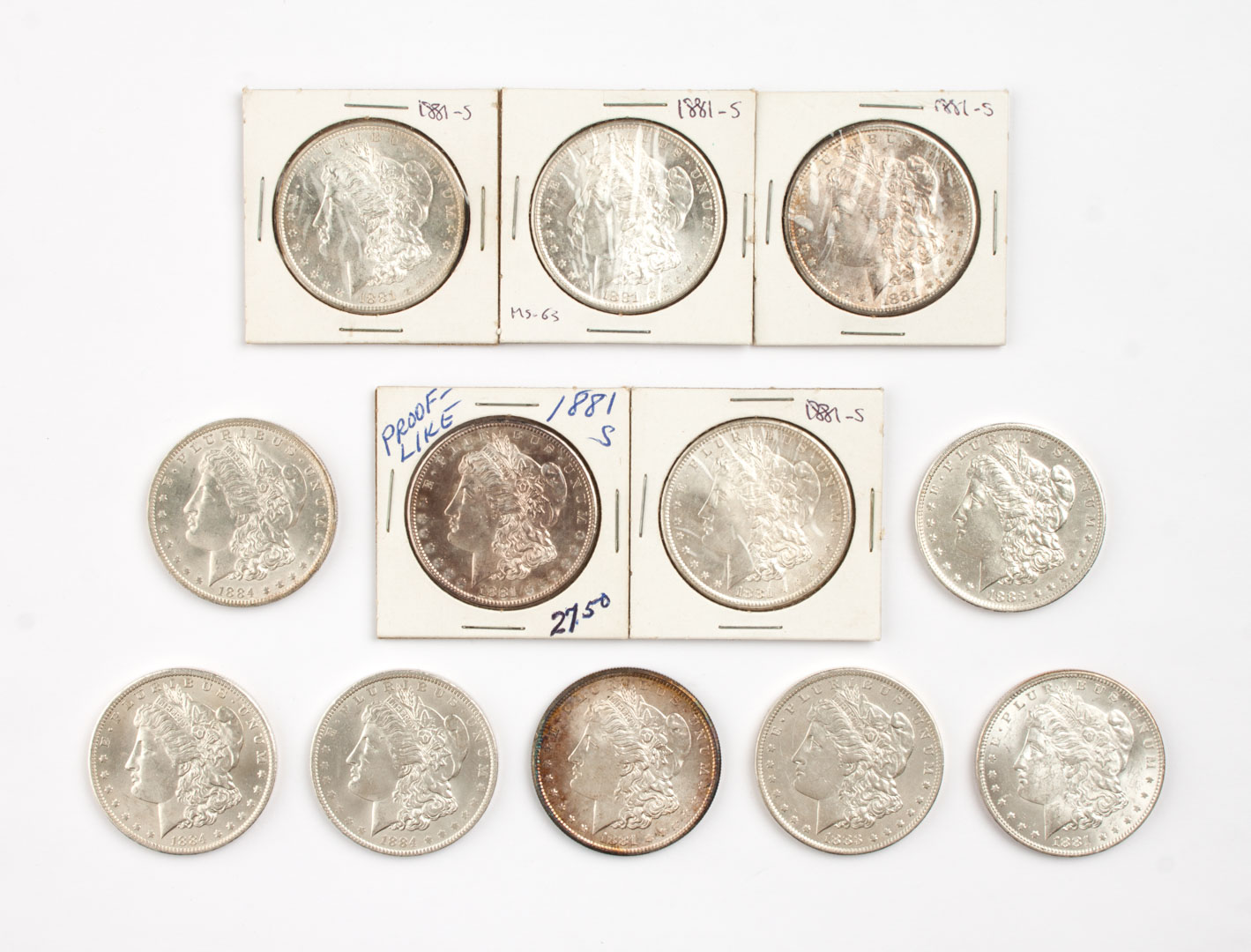 Appraisal: Twelve U S Morgan type silver dollars -' comprising MS-