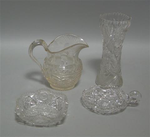 Appraisal: FOUR GLASS WARES Including a waisted vase a pitcher a