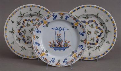 Appraisal: PAIR OF DUTCH POLYCHROME PLATES AND A SINGLE PLATE The