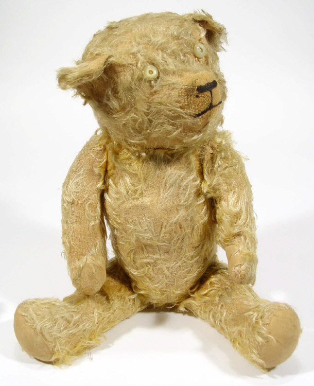 Appraisal: Two jointed teddy bears with beaded eyes largest cm high