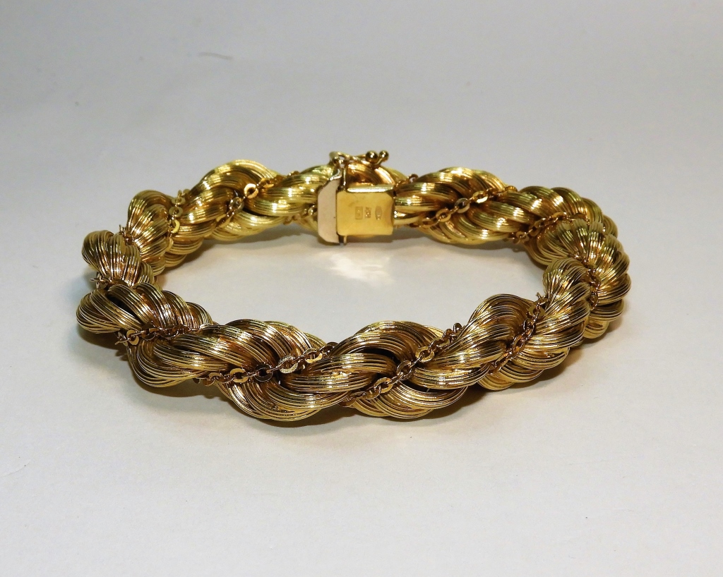 Appraisal: K GOLD FANCY BRAIDED ROPE TWIST BRACELET G Unknown th