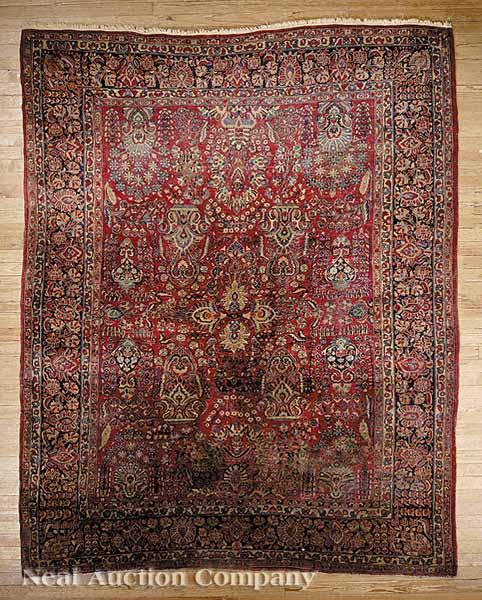 Appraisal: An Antique Kashan Carpet red ground central field with repeating