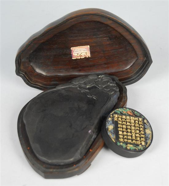 Appraisal: CHINESE LEAF CARVED INKSTONE in fitted wood box inscribed with