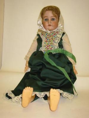 Appraisal: A Kammer Reinhardt bisque head girl doll with blue glass