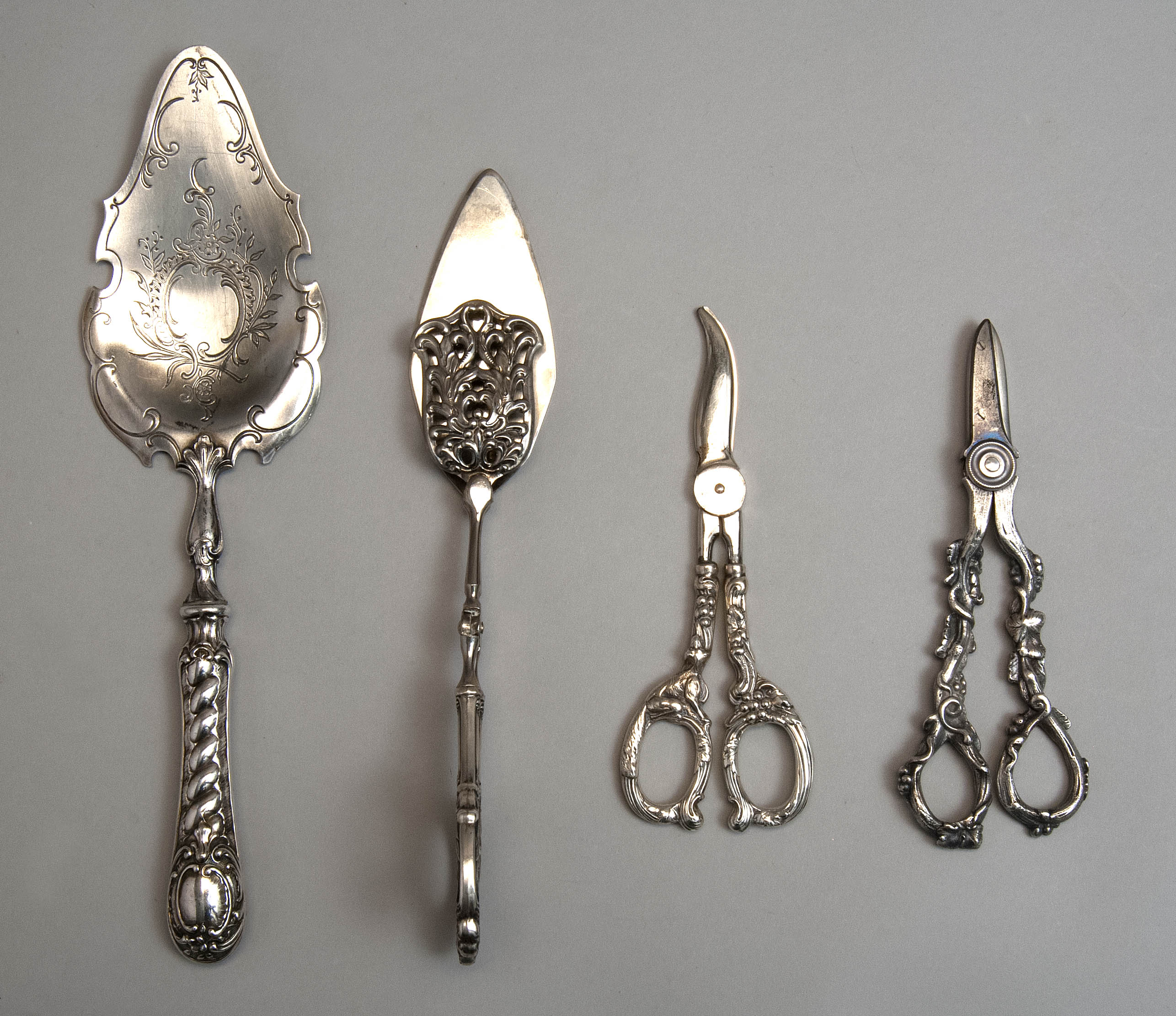 Appraisal: FOUR STERLING SILVER AND SILVER PLATED FLATWARE SERVING PIECES Late