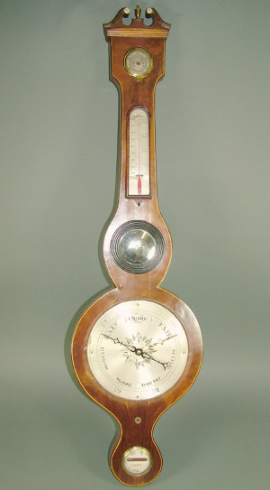 Appraisal: A th century wheel barometer the mahogany case with line