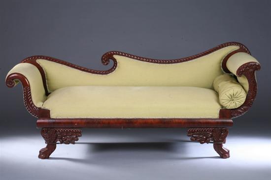 Appraisal: AMERICAN EMPIRE CARVED MAHOGANY CORNUCOPIA SOFA th century with lime