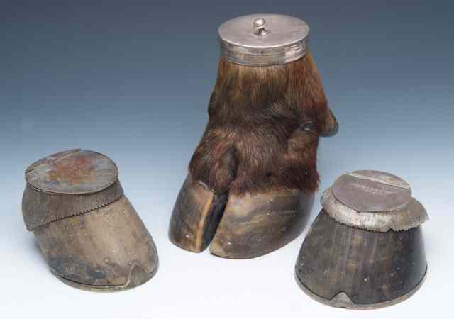 Appraisal: A MATCH STRIKER constructed from a horse's hoof with silver