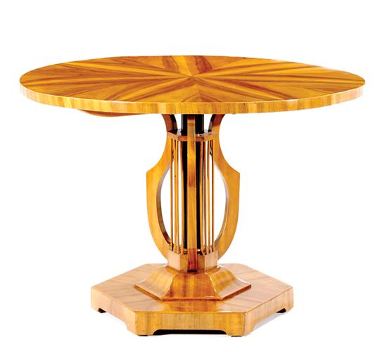 Appraisal: Fine Biedermeier circular tilt-top walnut center table circa sunburst top