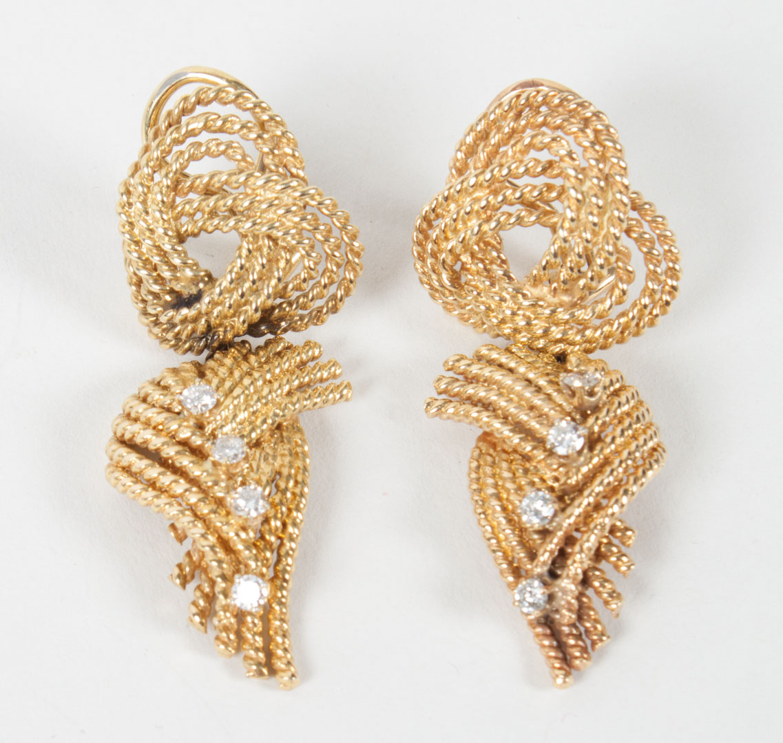 Appraisal: Lady's gold and diamond earrings marked K grams Condition Additional