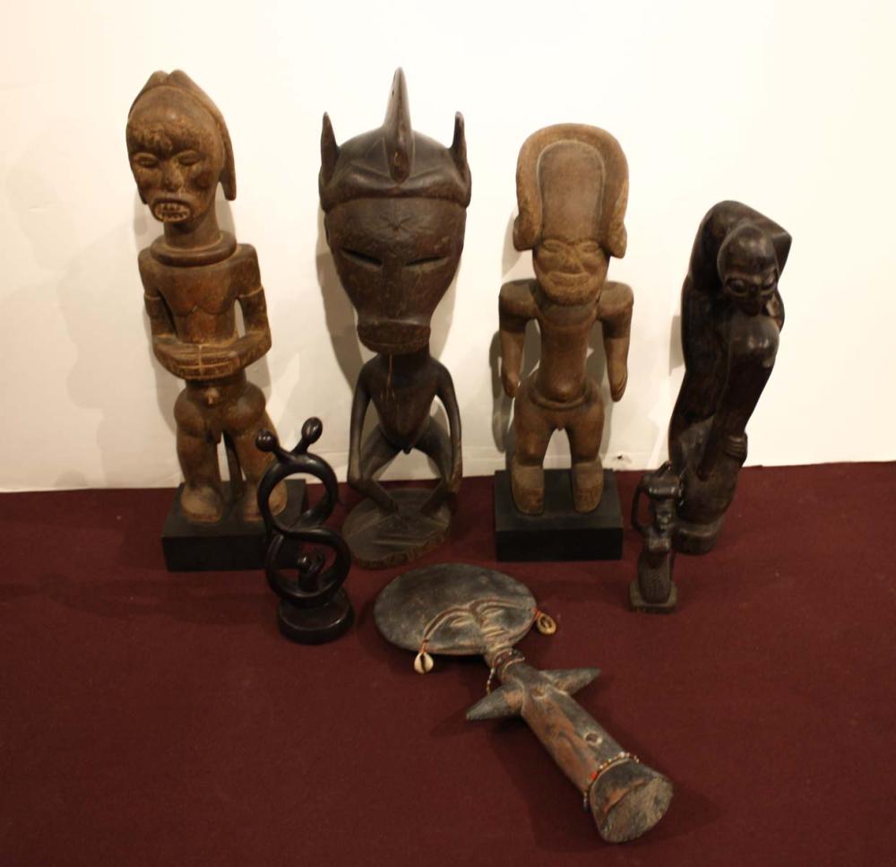 Appraisal: SEVEN FIGURAL AFRICAN TRIBAL WOOD CARVINGS to inch heights