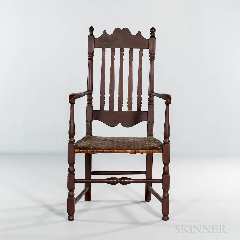 Appraisal: Brown-painted Bannister-back Armchair Brown-painted Bannister-back Armchair New England last half