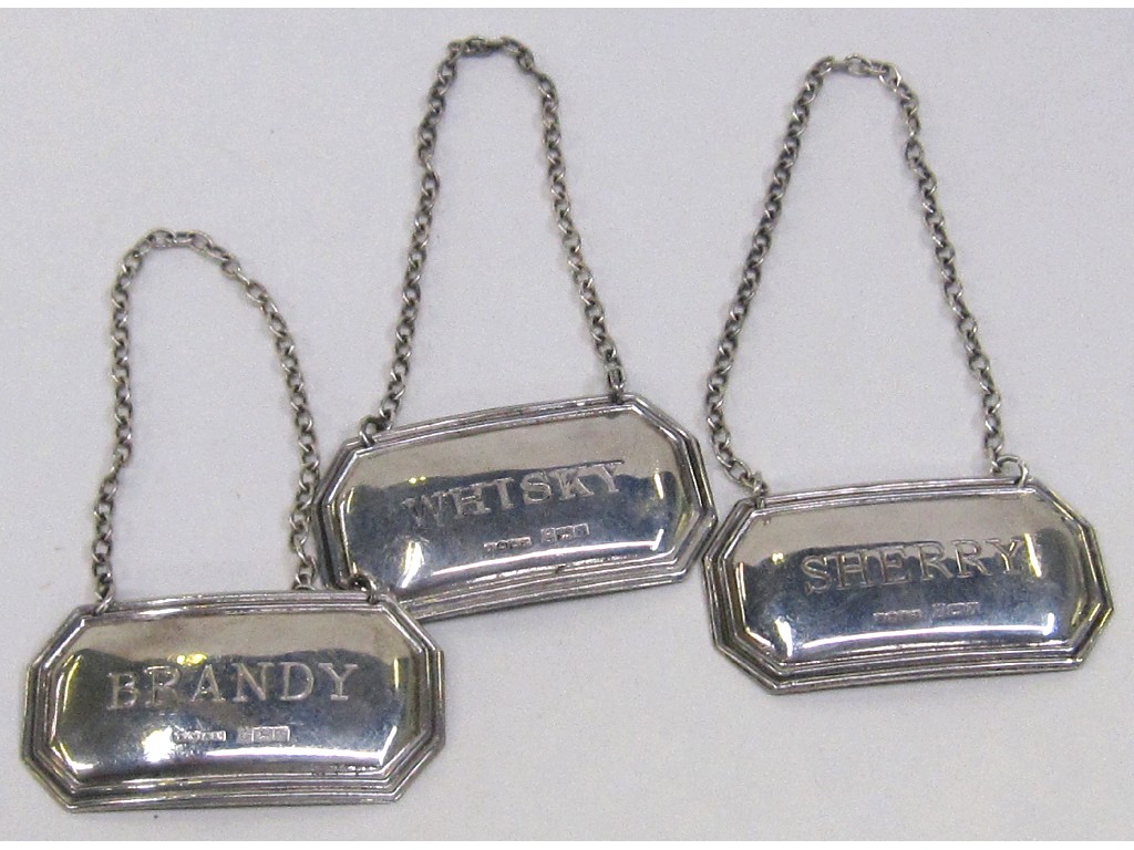 Appraisal: Set of three silver decanter labels - Sherry Whisky Brandy