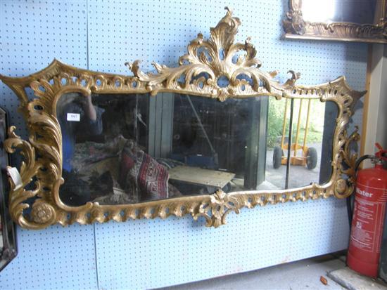 Appraisal: Chippendale style carved wood gilt frame wall mirror with carved