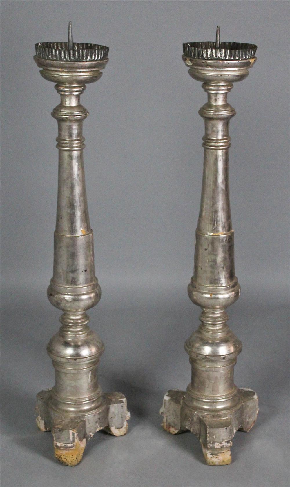 Appraisal: PAIR OF BAROQUE STYLE SILVERED PRICKET STICKS th Century -