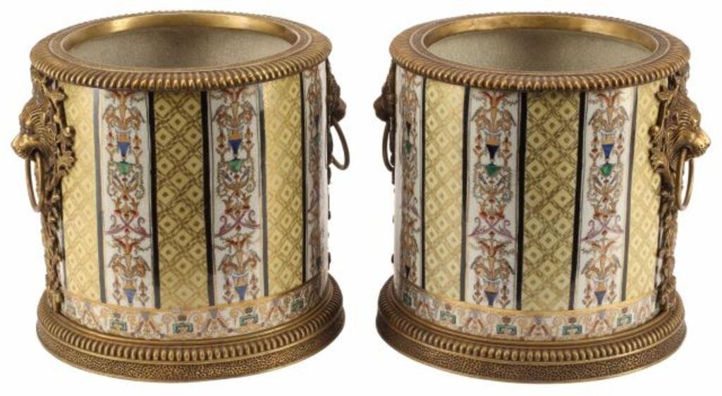 Appraisal: pair Porcelain cache pots with bronze dore mounts with lion's-head