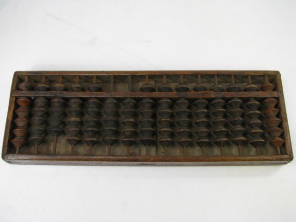 Appraisal: This early calculator has wonderful Chinese carvings front back Held