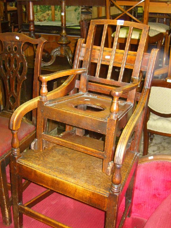 Appraisal: A Georgian country made elm wood child's rocking chair with