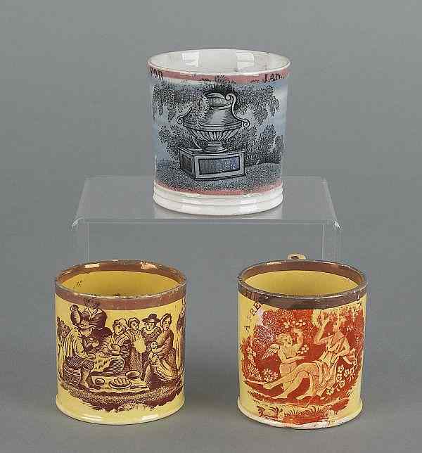 Appraisal: Three Staffordshire child's mugs early th c to include two