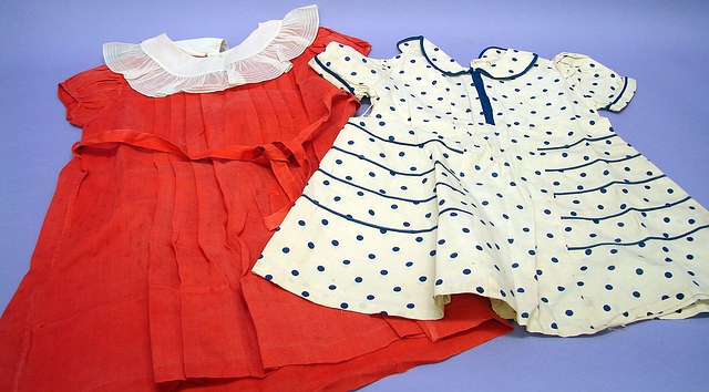 Appraisal: Pair of authentic frocks by Cinderella 's children's dresses Red