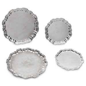 Appraisal: A Group of Four English Silver Waiters Mappin Webb London