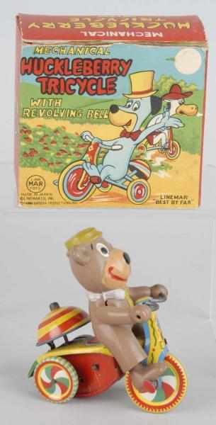 Appraisal: Tin Celluloid Linemar Yogi Bear Tricycle Toy Description Japanese Wind-up