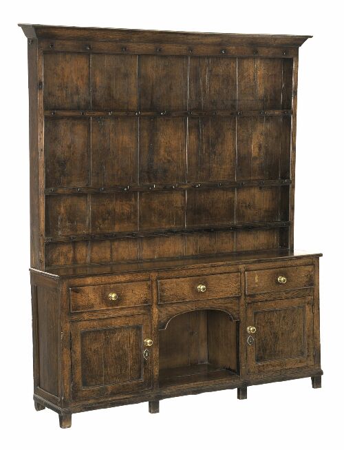 Appraisal: A George III oak dresser probably Welsh the plain cornice