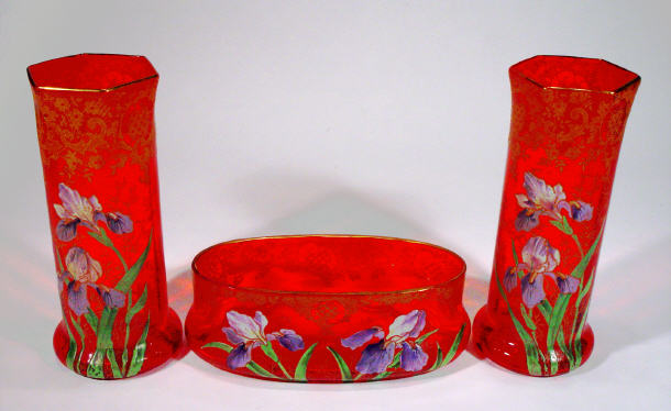 Appraisal: French ruby red glass three piece garniture the bowl and