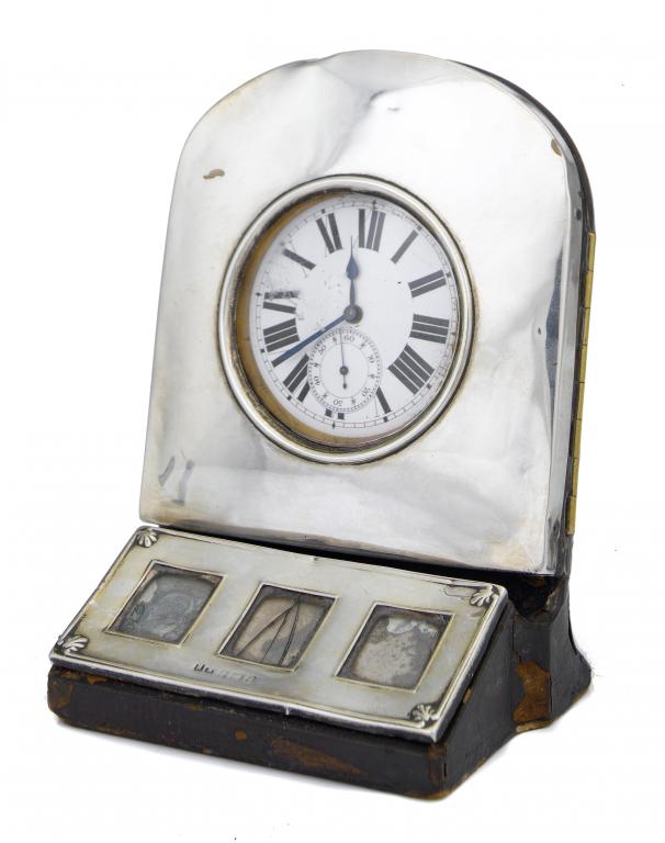 Appraisal: AN EDWARD VII SILVER-MOUNTED COMBINED DESK WATCH-STAND AND POSTAGE STAMP