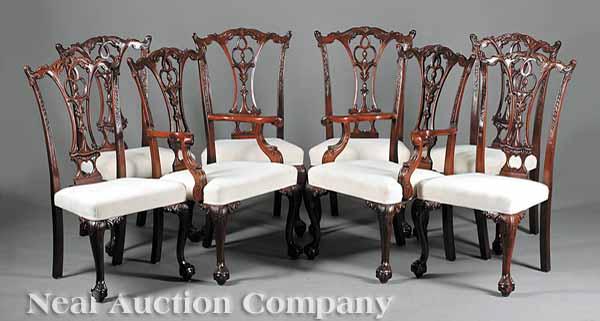 Appraisal: A Set of Eight George III-Style Carved Mahogany Dining Chairs