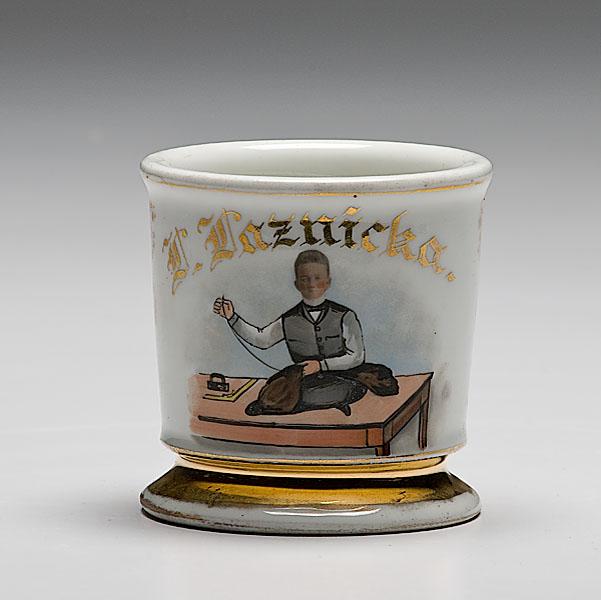 Appraisal: UNUSUAL OCCUPATIONAL SHAVING MUG OF TAILOR WITH PHOTOGRAPHIC TRANSFERRED FACE