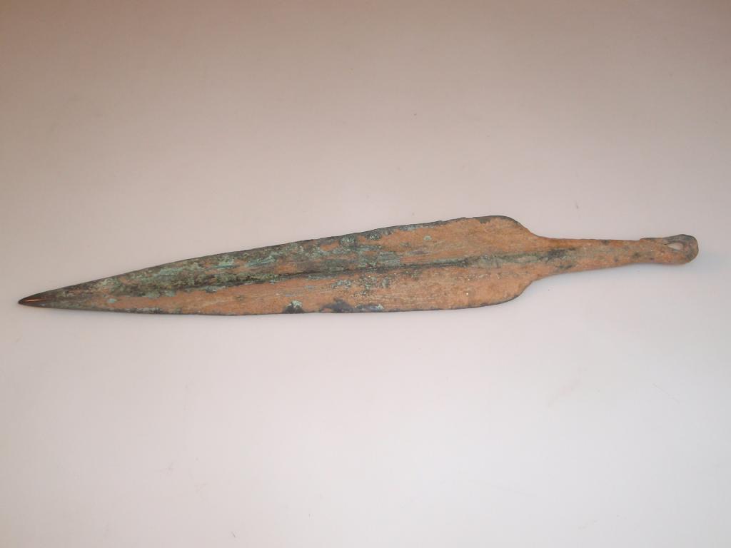 Appraisal: A Near Eastern cast bronze dagger blade with a broad