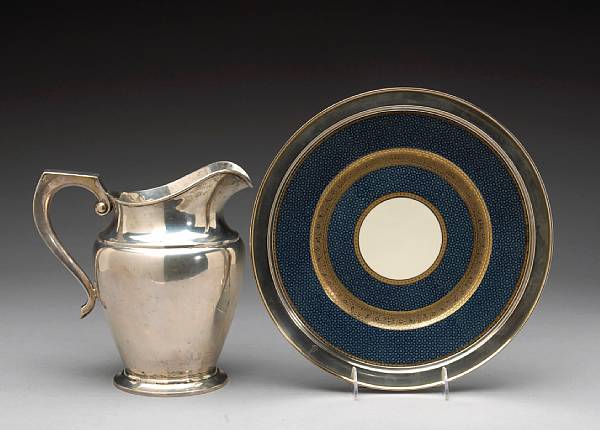 Appraisal: A sterling pints water pitcher and a Rosenthal porcelain cake