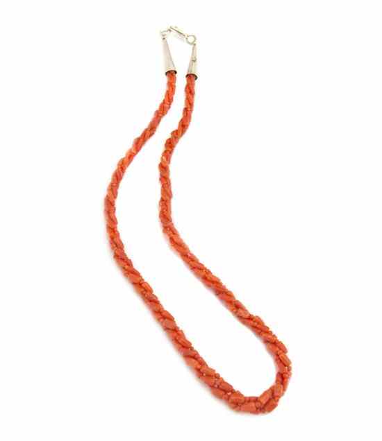 Appraisal: A Santo Domingo Three Strand Twisted Coral Bead Necklace terminating