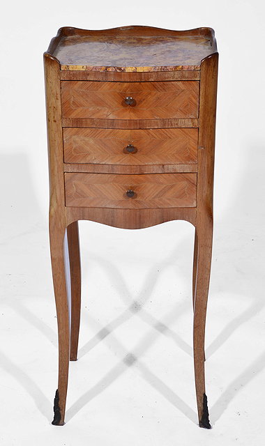 Appraisal: A SMALL WALNUT CONTINENTAL BEDSIDE TABLE with marble inset top