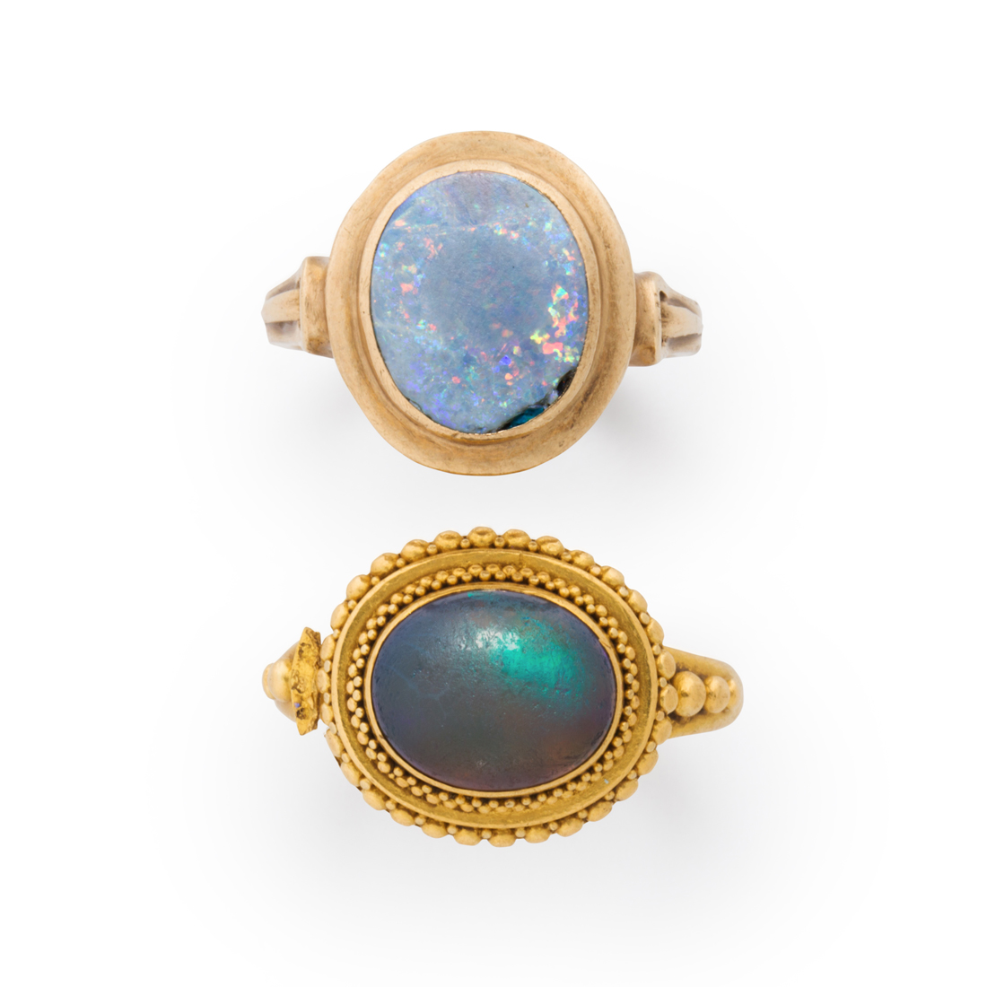 Appraisal: A GROUP OF OPAL AND GOLD RINGS A group of