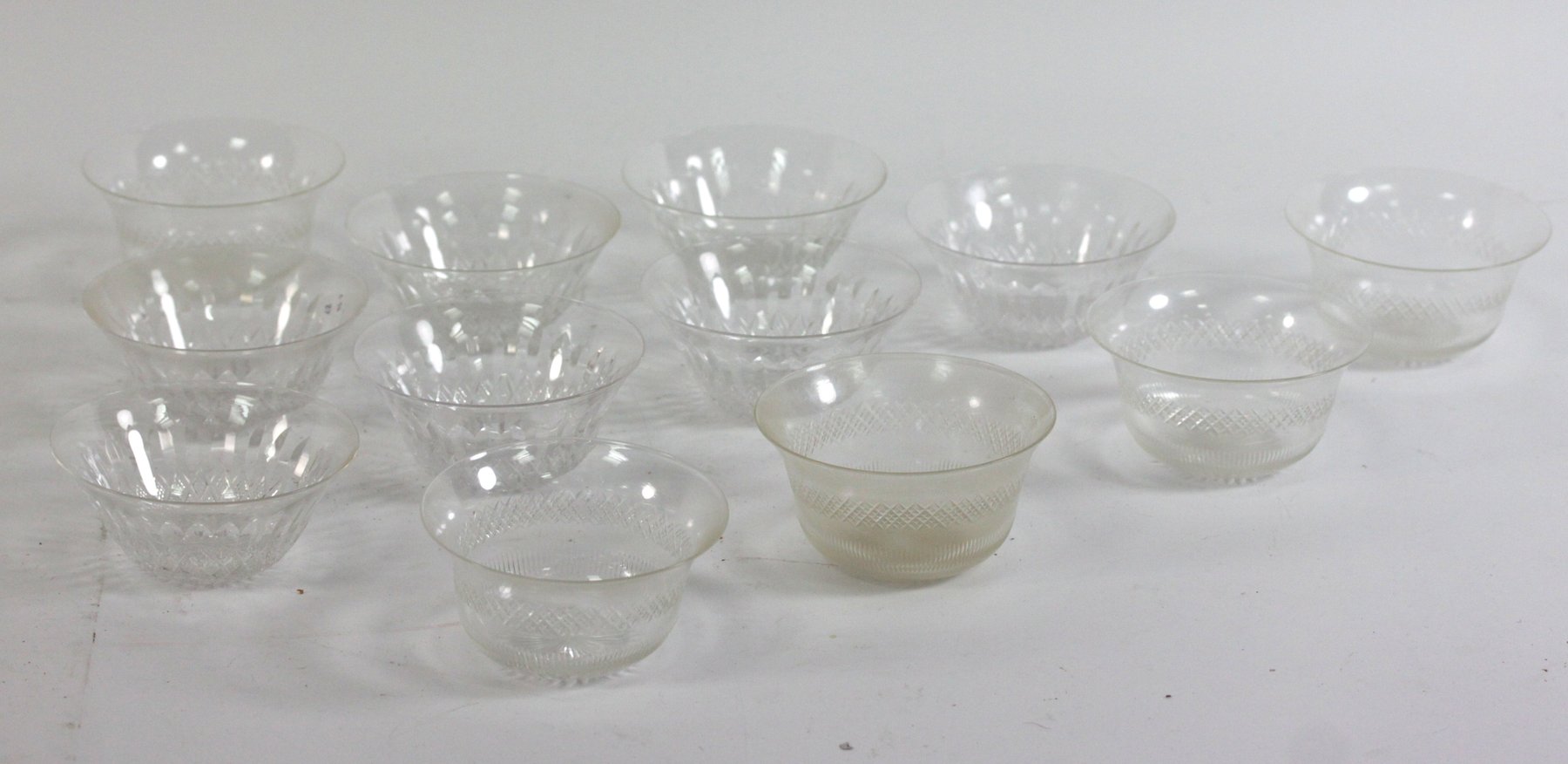 Appraisal: A part set of seven cut glass finger bowls and